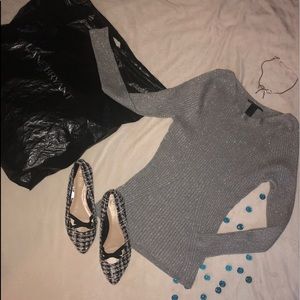 Shiny silver thin sweater with slimming lines